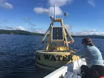 researcher and buoy